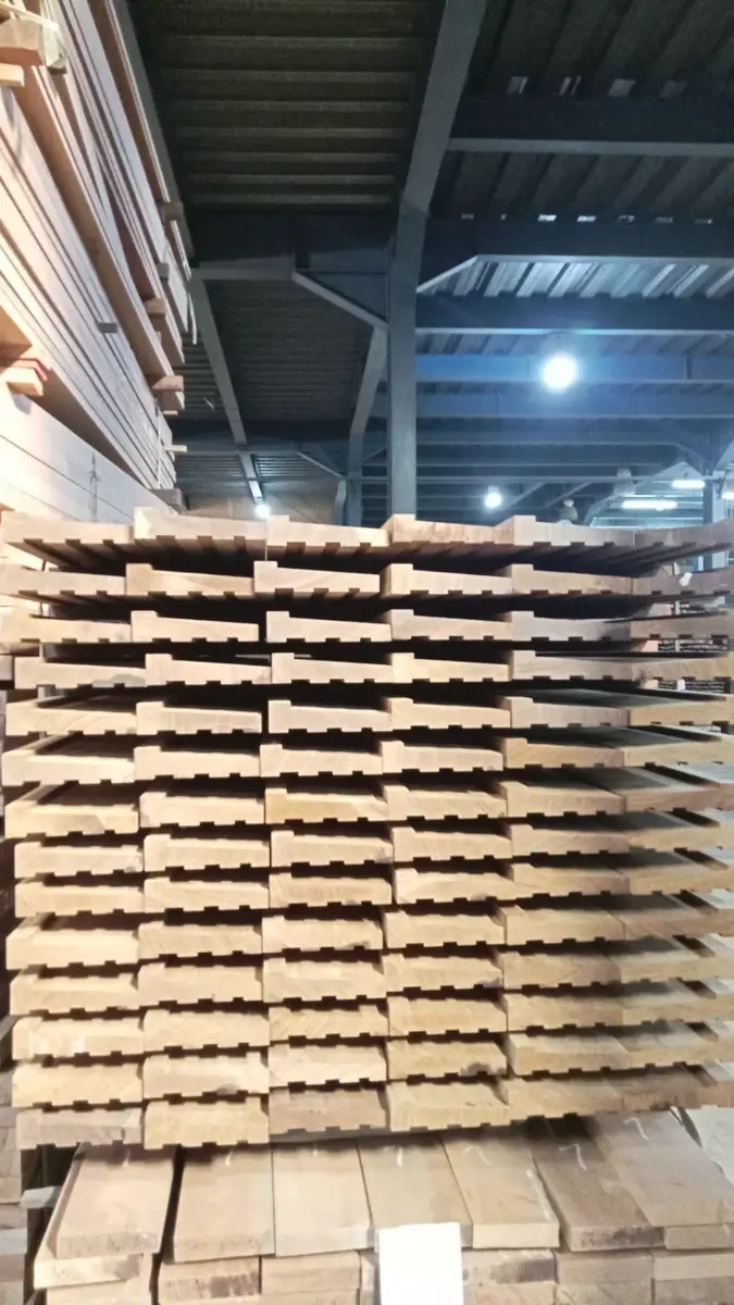 Hardwood decking profiles stacked in the factory