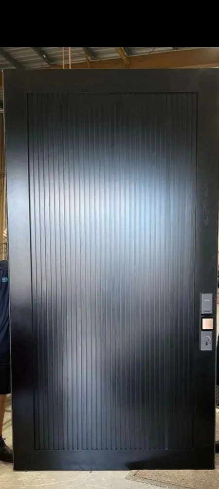 Black finished fluted hardwood door